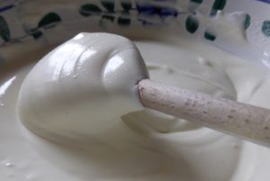 Spoon with dollop of cream