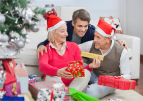 Son with his elderly parents at Christmas