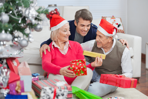 Son with his elderly parents at Christmas