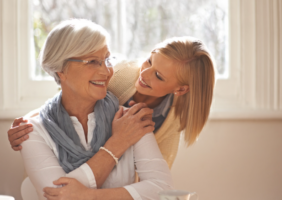 Mother and daughter enjoying tea together