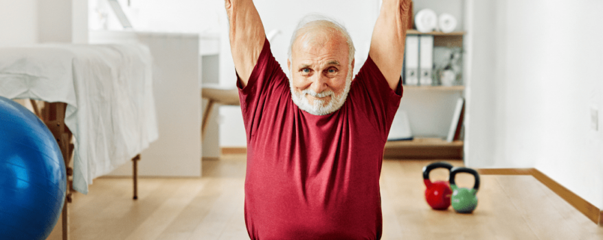 Elderly Man working out in his home