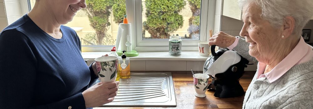 Mother and Daughter in kitchen making tea with the Uccello Kettle