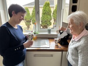 Mother and Daughter in kitchen making tea with the Uccello Kettle