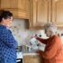 Mother and daughter in the kitchen and making tea
