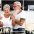 Elderly couple preparing dinner in the kitchen